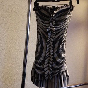 Gently used BeBe party dress MED